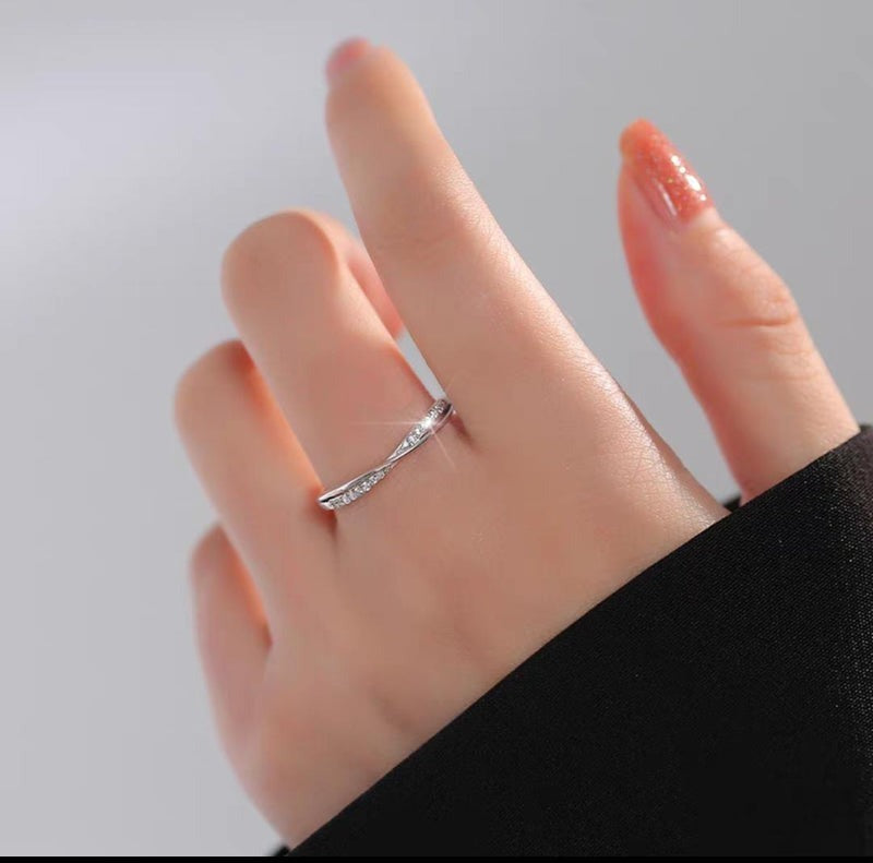 Elegant Silver Twirl Adjustable Ring with Pave Zircons - 925 Sterling